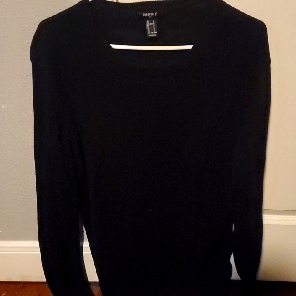 Solid black crew neck